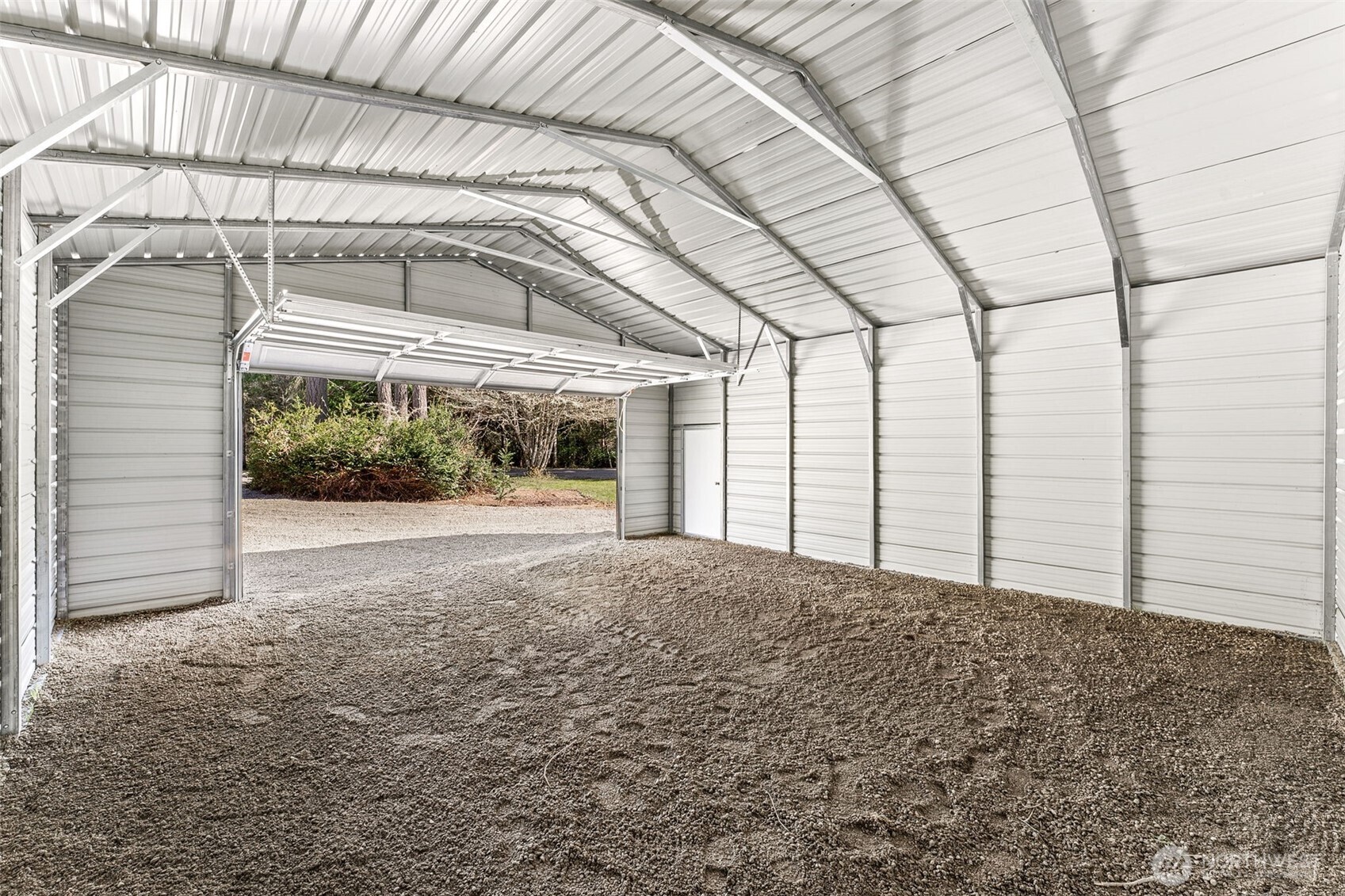 6198 Clover Valley Road Southeast Port Orchard, WA 98367 - Photo 21 of 34 a view of a house with a yard
