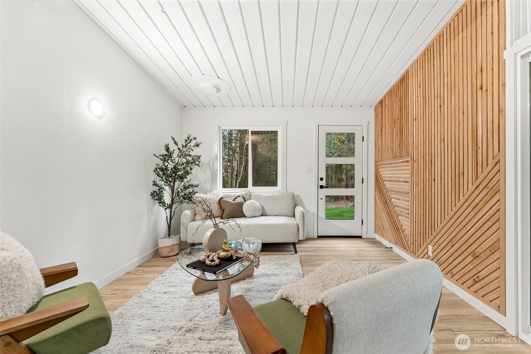 6198 Clover Valley Road Southeast Port Orchard, WA 98367 - Photo 7 of 34 a living room with furniture and a window