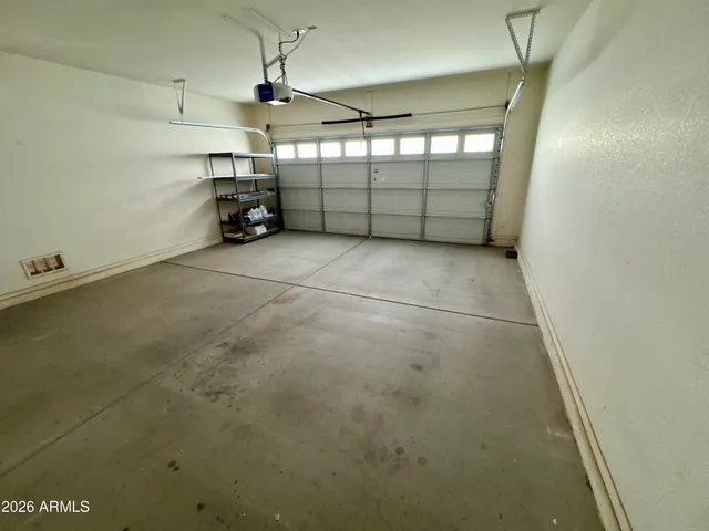 a backyard of a house with plants