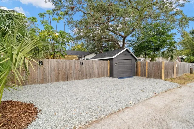 a house with a tree in front of it