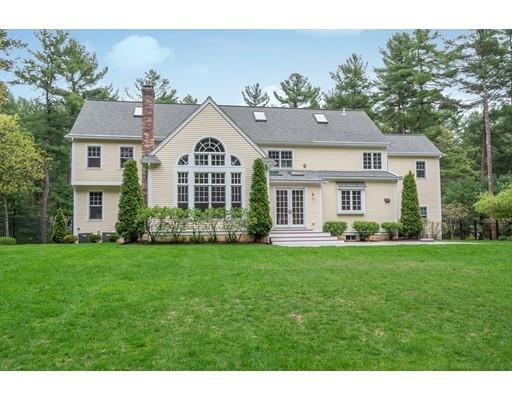 3 Valley Road Dover, MA 02030 - Photo 5 of 30 a front view of a house with a garden