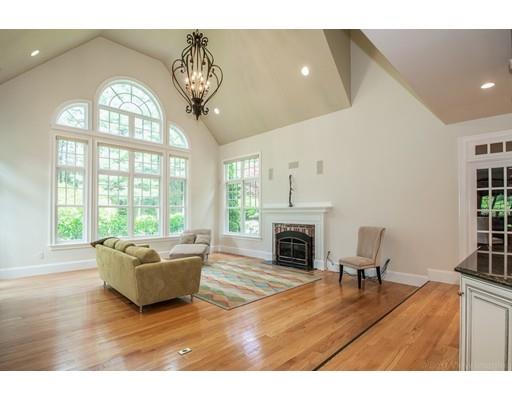 3 Valley Road Dover, MA 02030 - Photo 8 of 30 a living room with furniture and a fireplace
