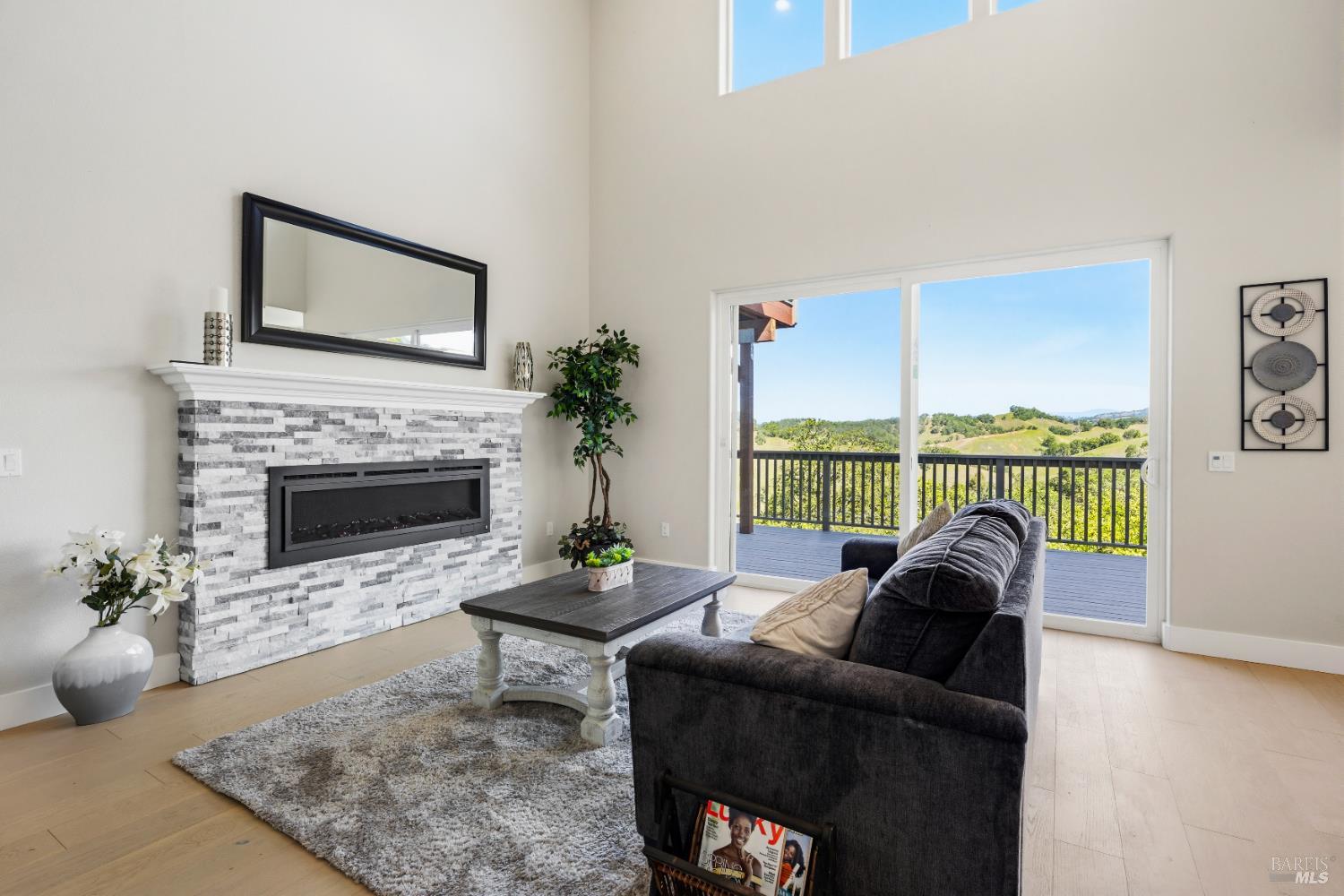 400 Tehuacan Road Ukiah, CA 95482 - Photo 11 of 57 Family room with electric fireplace opens to deck and amazing views