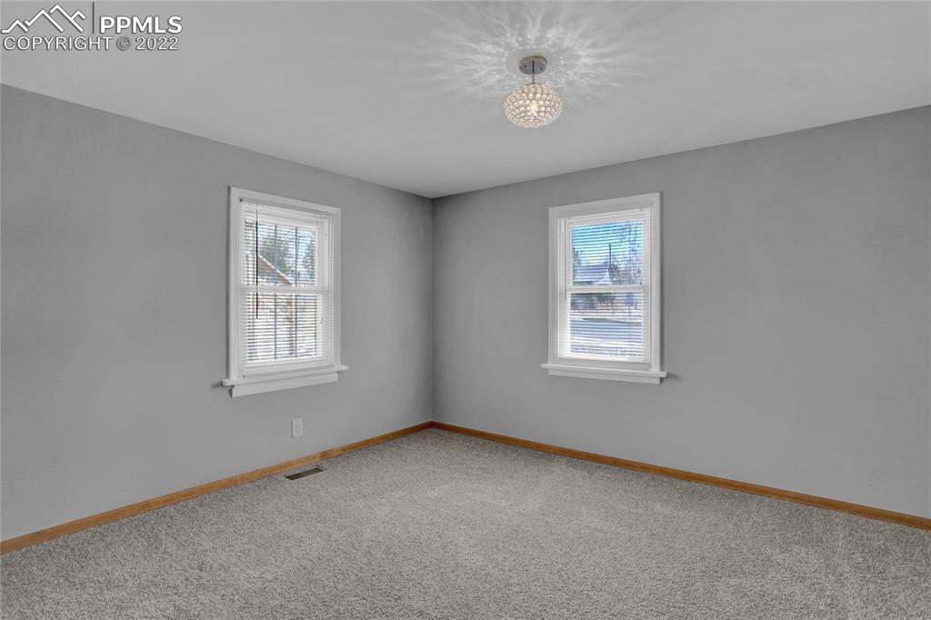 1024 Prairie Road Colorado Springs, CO 80909 - Photo 13 of 22 a view of an empty room with a window