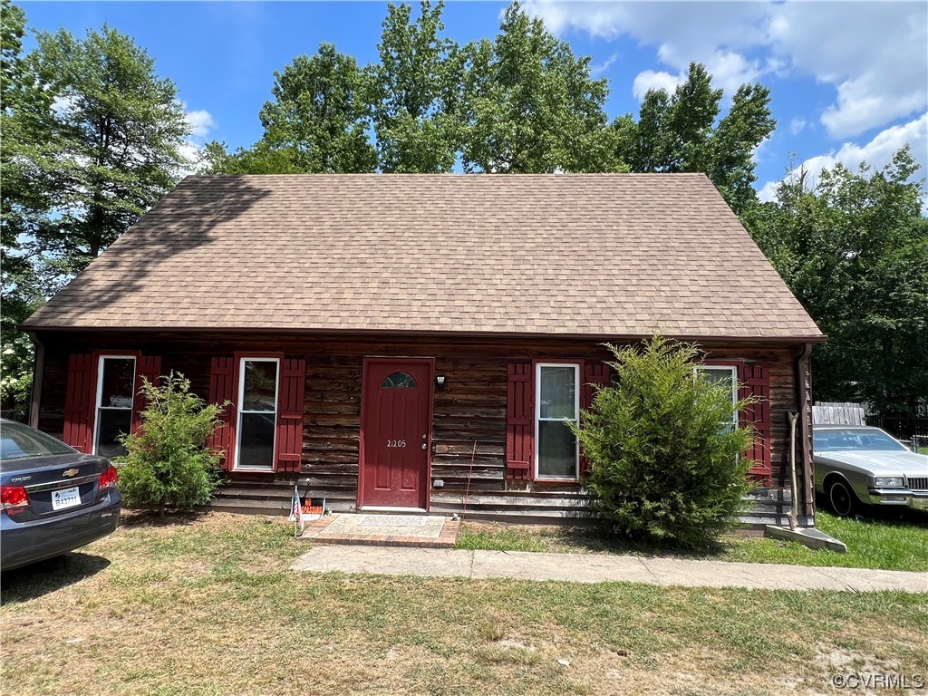 21205 Matoaca Road Petersburg, VA 23803 - Photo 1 of 10 front view of a house with a yard