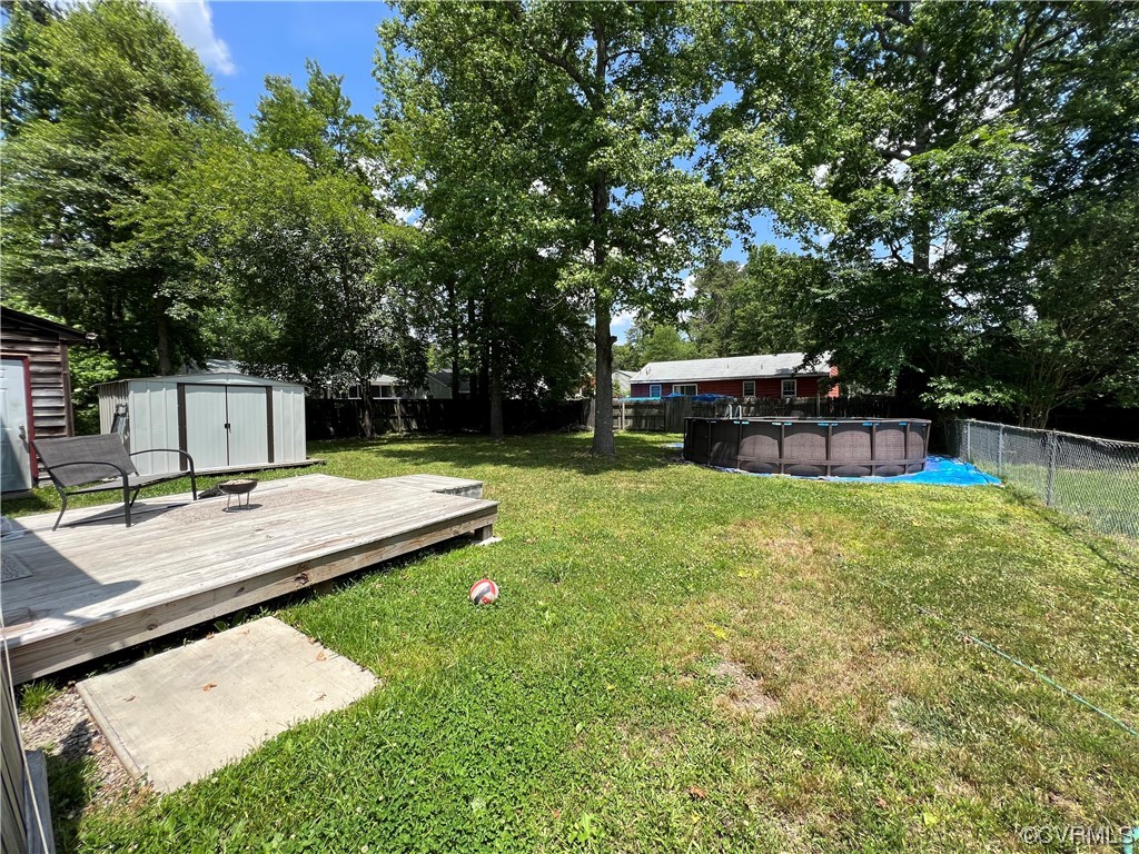21205 Matoaca Road Petersburg, VA 23803 - Photo 9 of 10 a view of a backyard with swimming pool