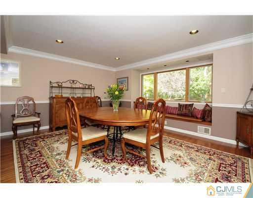 7 Doyle Road Old Bridge, NJ 07747 - Photo 3 of 10 a view of a dining room with furniture window and wooden floor