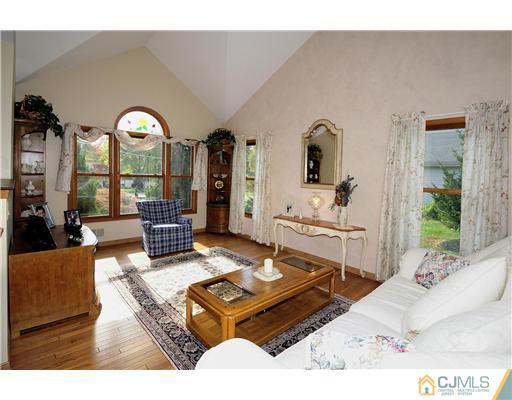 7 Doyle Road Old Bridge, NJ 07747 - Photo 5 of 10 a living room with furniture rug and window