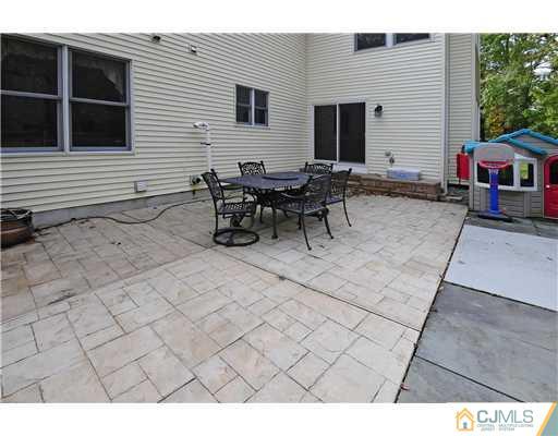 7 Doyle Road Old Bridge, NJ 07747 - Photo 10 of 10 a view of a outdoor space with a table and chairs