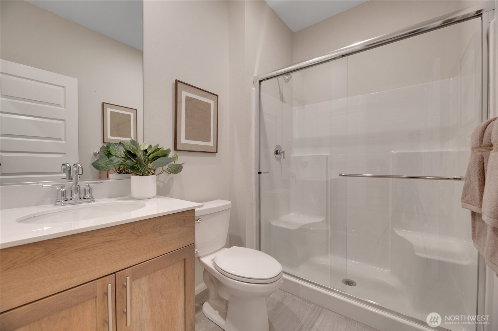 13627 60th Avenue West Edmonds, WA 98026 - Photo 12 of 29 a bathroom with a sink toilet and shower