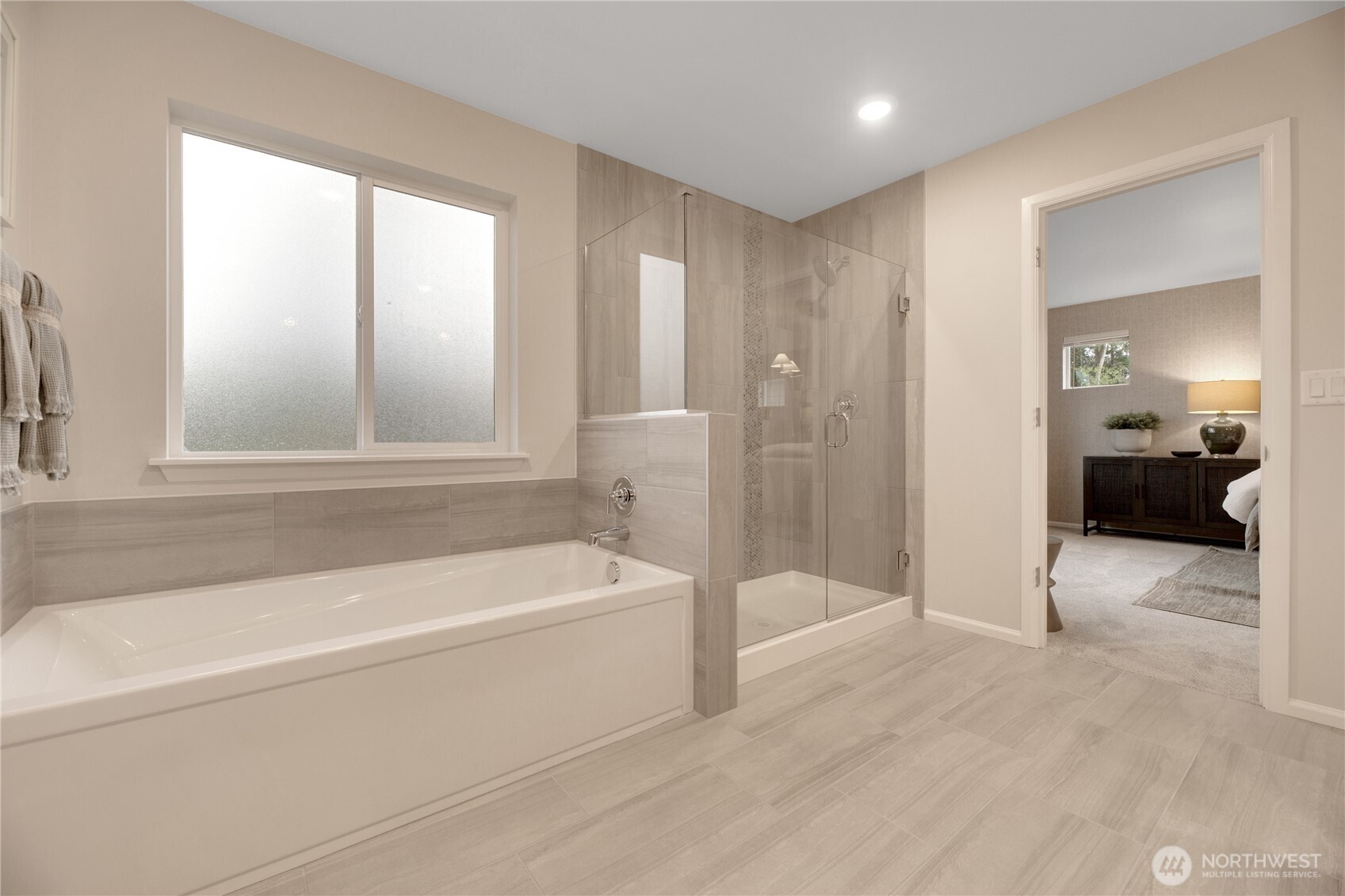 13627 60th Avenue West Edmonds, WA 98026 - Photo 20 of 29 a bathroom with a bathtub and a shower