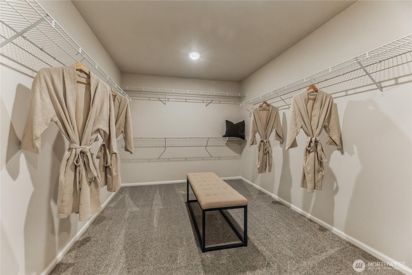 13627 60th Avenue West Edmonds, WA 98026 - Photo 21 of 29 a view of walk in closet with clothes and shoes