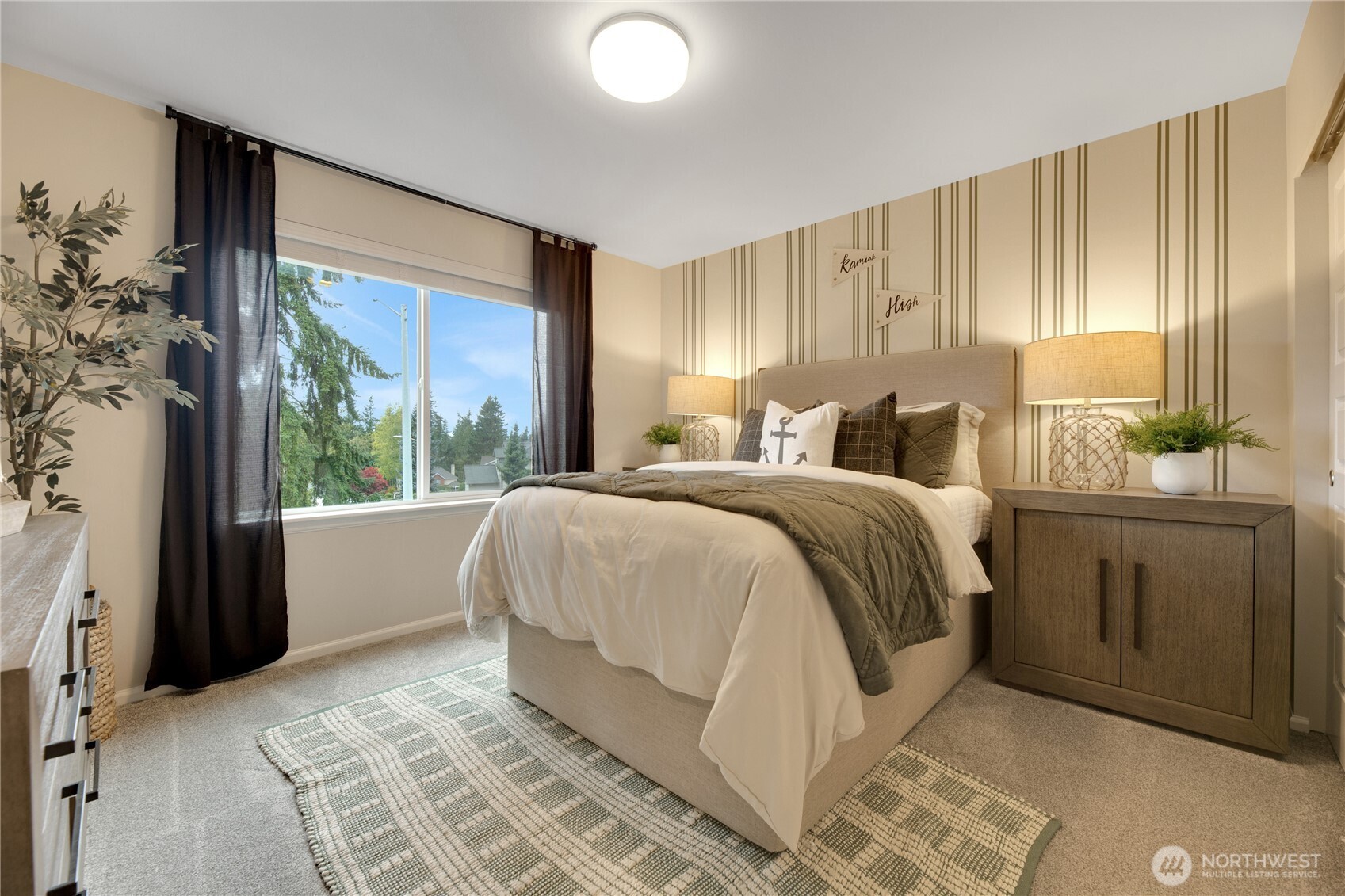 13627 60th Avenue West Edmonds, WA 98026 - Photo 22 of 29 a bedroom with a large bed and a window