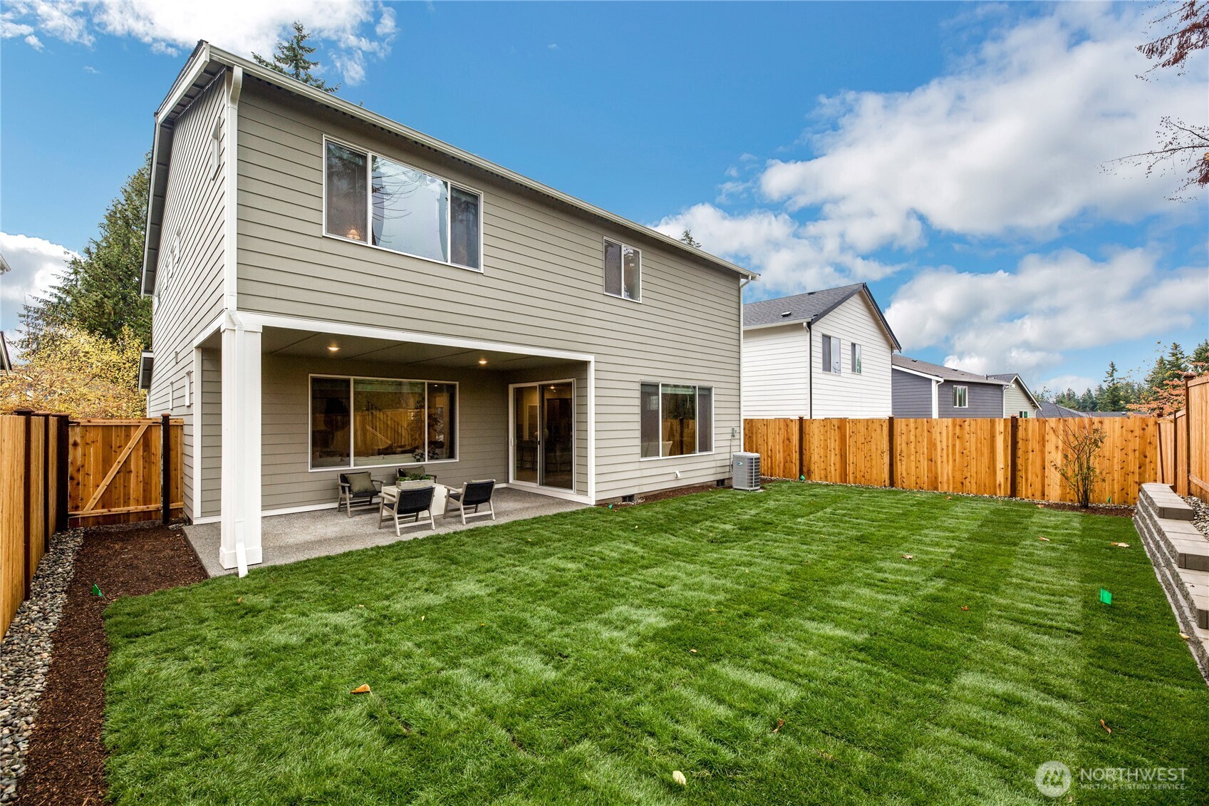 13627 60th Avenue West Edmonds, WA 98026 - Photo 29 of 29 a view of a house with backyard porch and garden