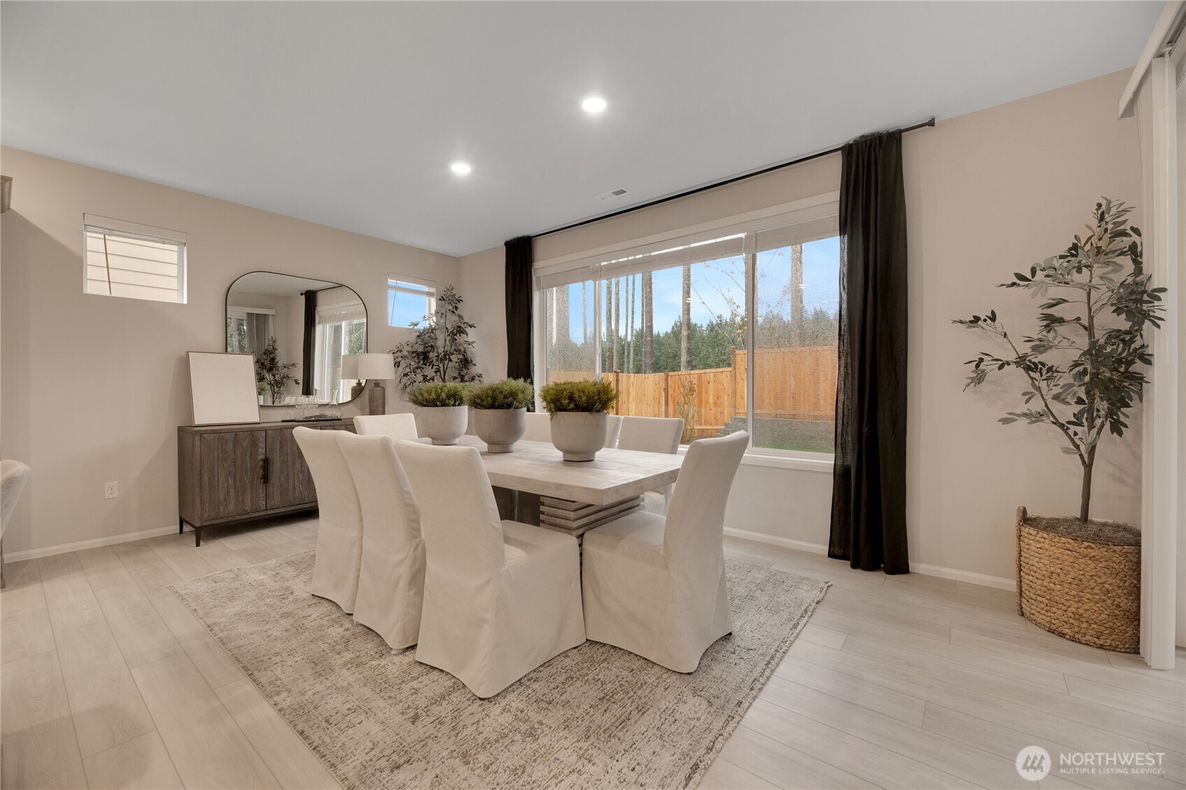 13627 60th Avenue West Edmonds, WA 98026 - Photo 5 of 29 a view of a dining room with furniture window and outside view