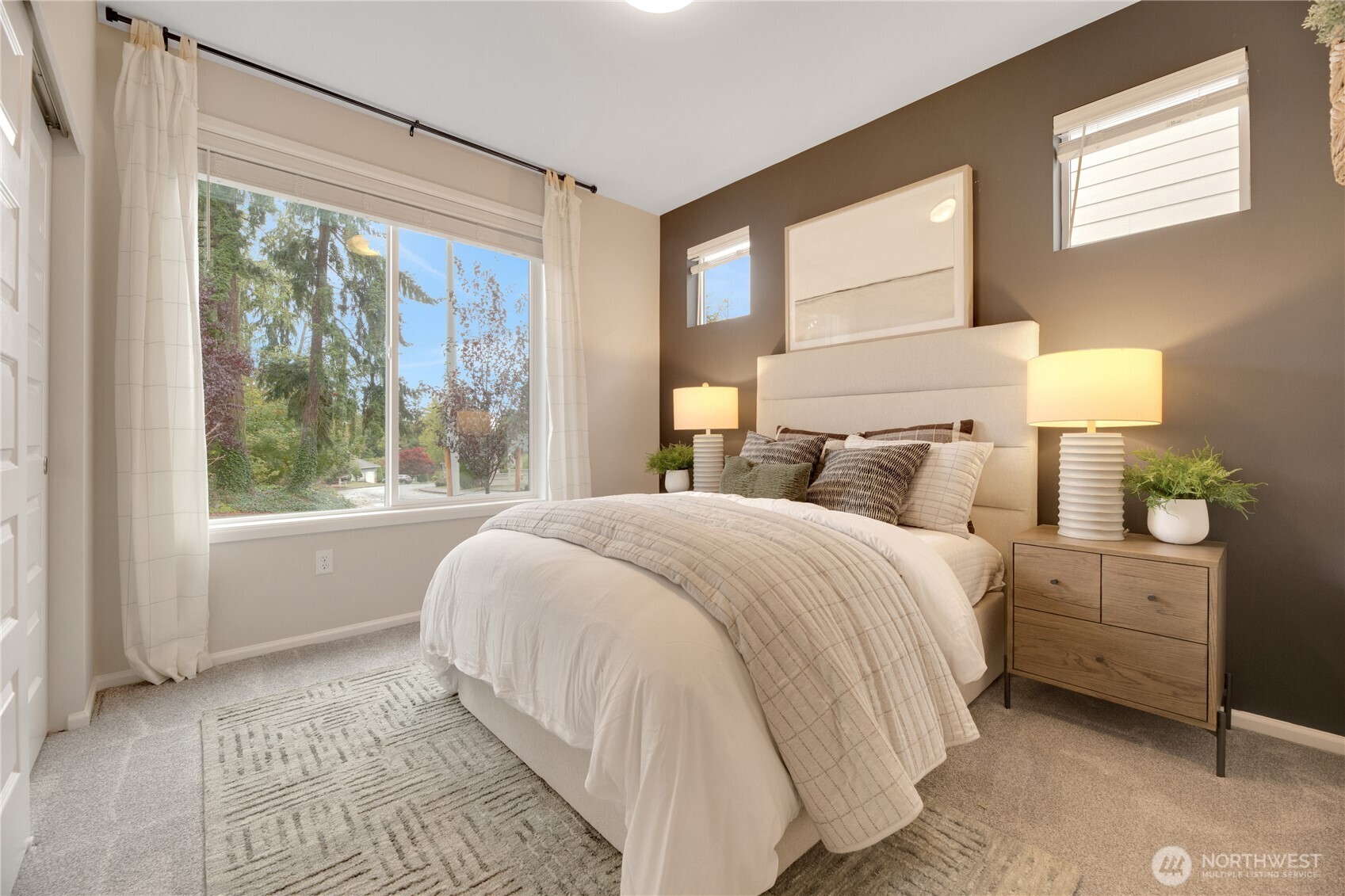13627 60th Avenue West Edmonds, WA 98026 - Photo 10 of 29 a bedroom with a bed and a window