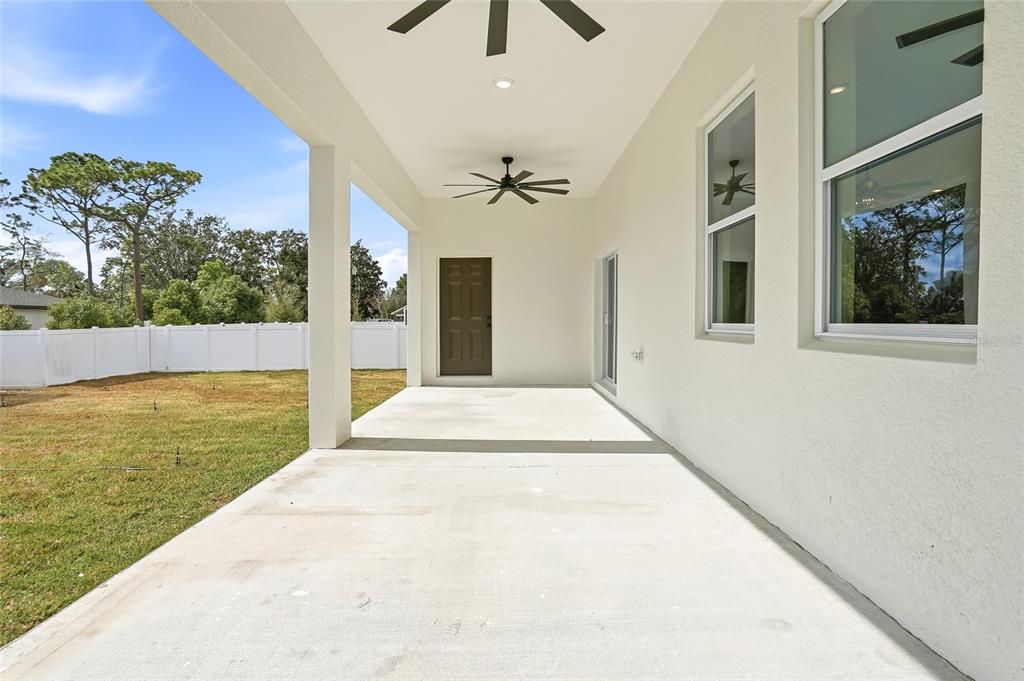 11256 Salters Street Spring Hill, FL 34609 - Photo 33 of 46 a view of balcony with a yard