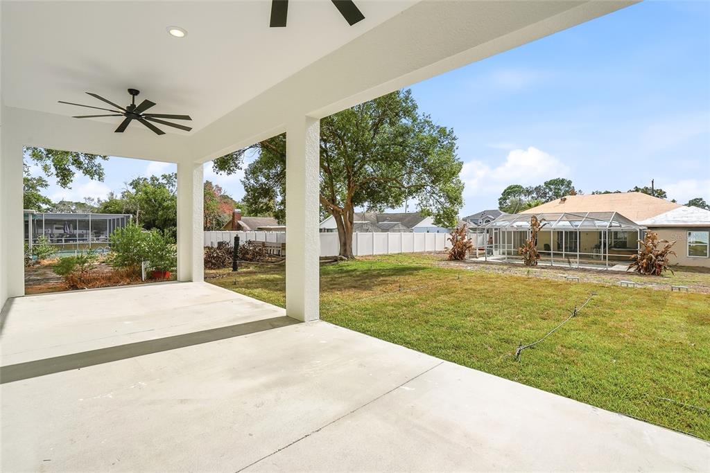 11256 Salters Street Spring Hill, FL 34609 - Photo 34 of 46 a house view with a garden space