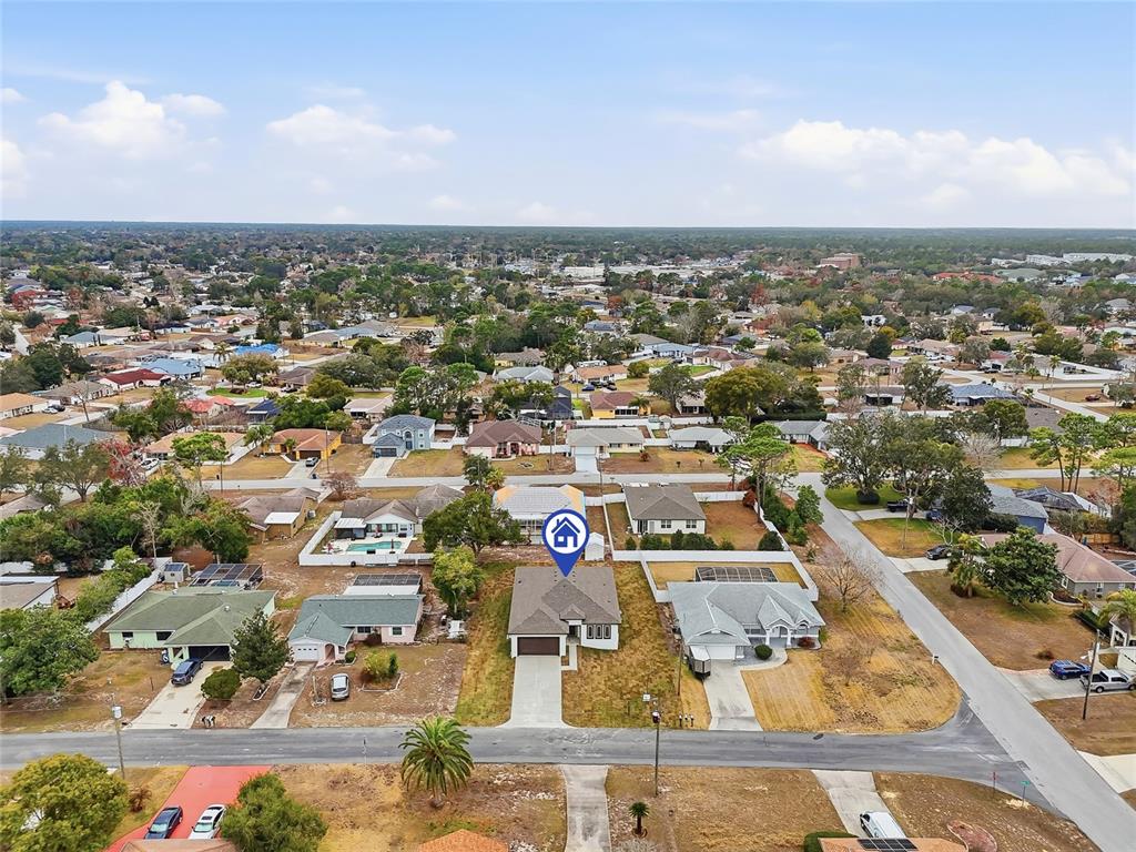 11256 Salters Street Spring Hill, FL 34609 - Photo 41 of 46 an aerial view of residential houses with city view