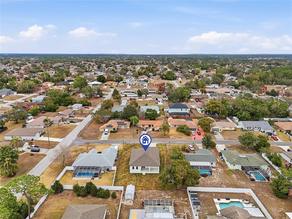 11256 Salters Street Spring Hill, FL 34609 - Photo 42 of 46 an aerial view of multiple house