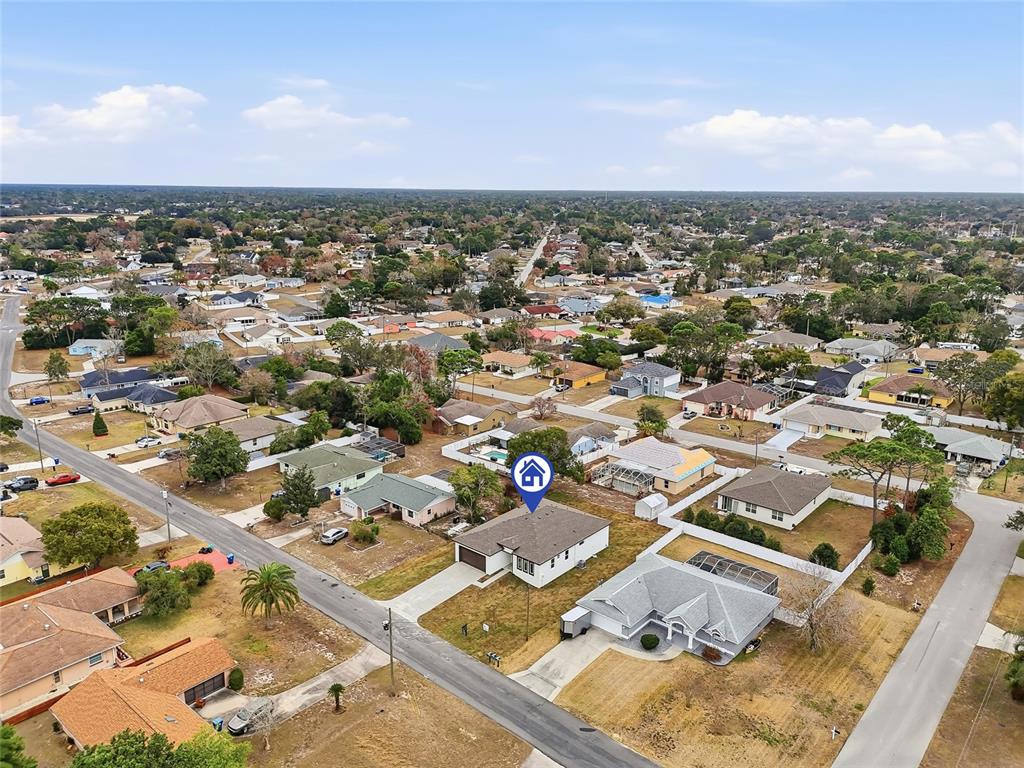 11256 Salters Street Spring Hill, FL 34609 - Photo 43 of 46 an aerial view of residential houses with city view