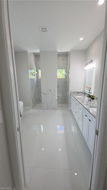 563 15th Street Northwest Naples, FL 34120 - Photo 15 of 22 a view of a kitchen from the hallway