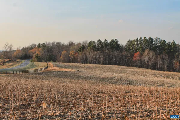 a view of dirt yard and mountain view