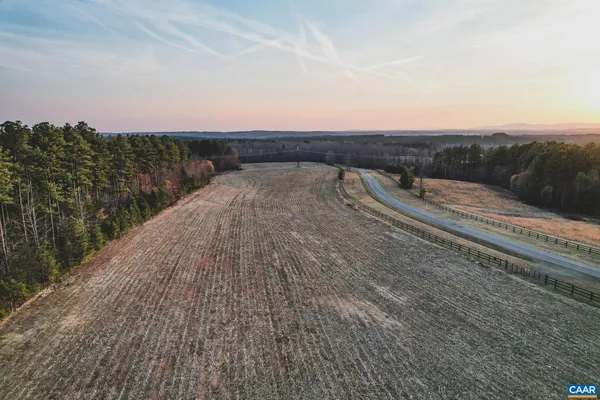 a view of mountain with sunset