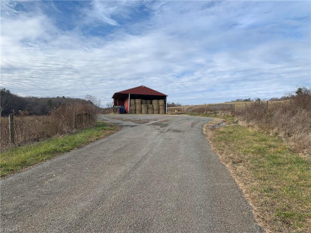 0 Leroy Gillespie Road Lowgap, NC 27024 - Photo 1 of 27 Entrance into farm cul-de-sac turn around