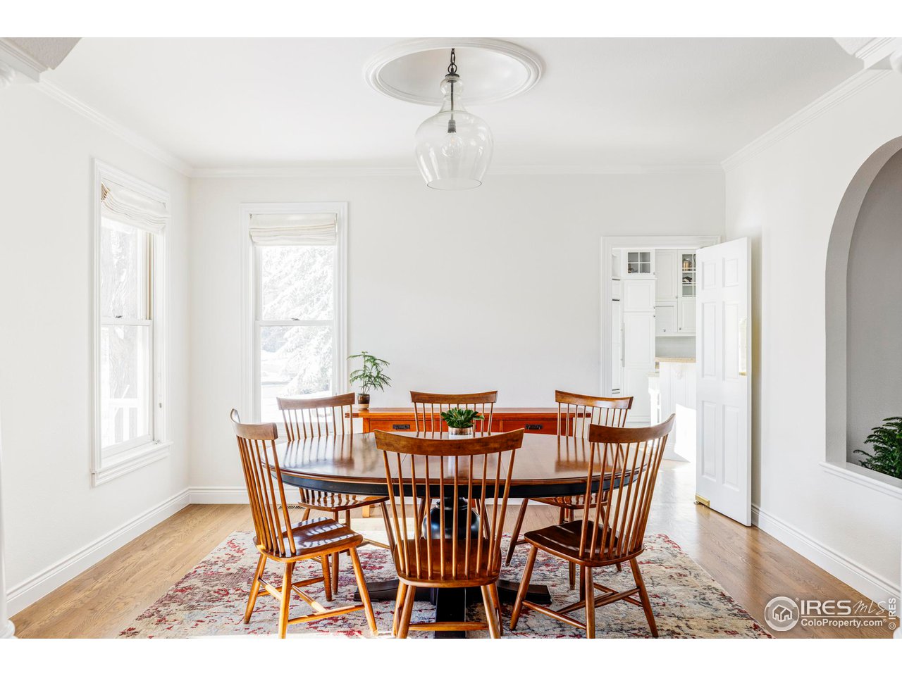 2485 Agate Lane Boulder, CO 80304 - Photo 12 of 38 a view of a dining room with furniture and wooden floor