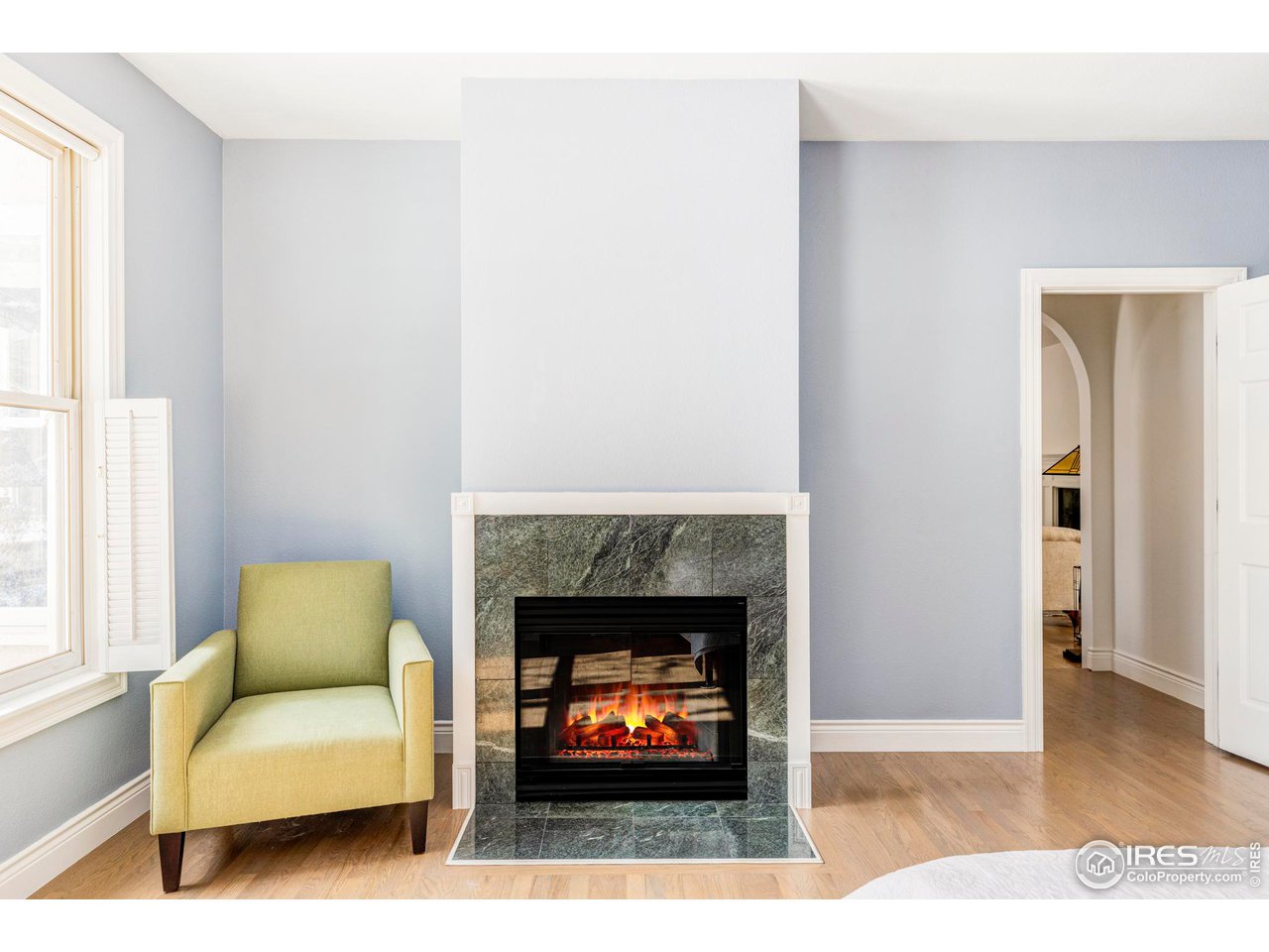 2485 Agate Lane Boulder, CO 80304 - Photo 17 of 38 a living room with furniture and a fireplace