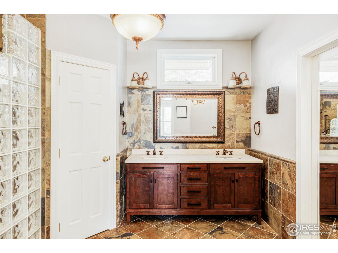 2485 Agate Lane Boulder, CO 80304 - Photo 18 of 38 a kitchen with a stove and cabinets