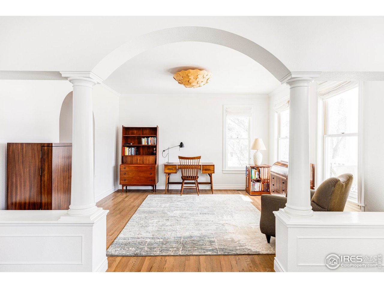 2485 Agate Lane Boulder, CO 80304 - Photo 2 of 38 a living room with furniture and a large window