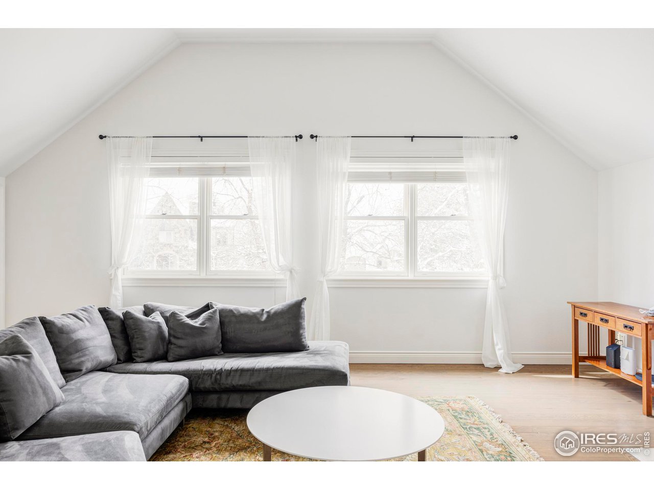2485 Agate Lane Boulder, CO 80304 - Photo 21 of 38 a living room with furniture and a window