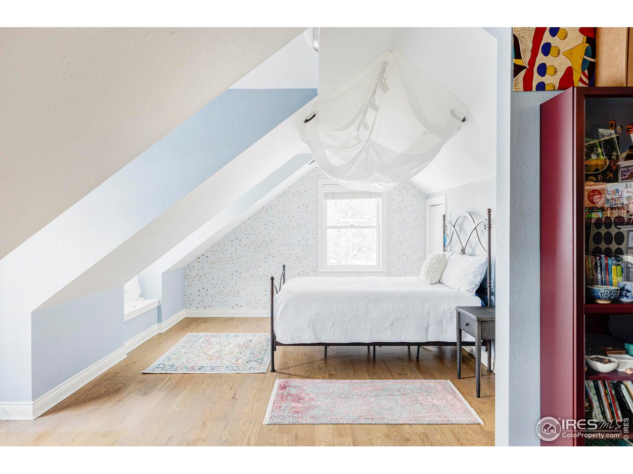 2485 Agate Lane Boulder, CO 80304 - Photo 24 of 38 a living room with furniture and a rug