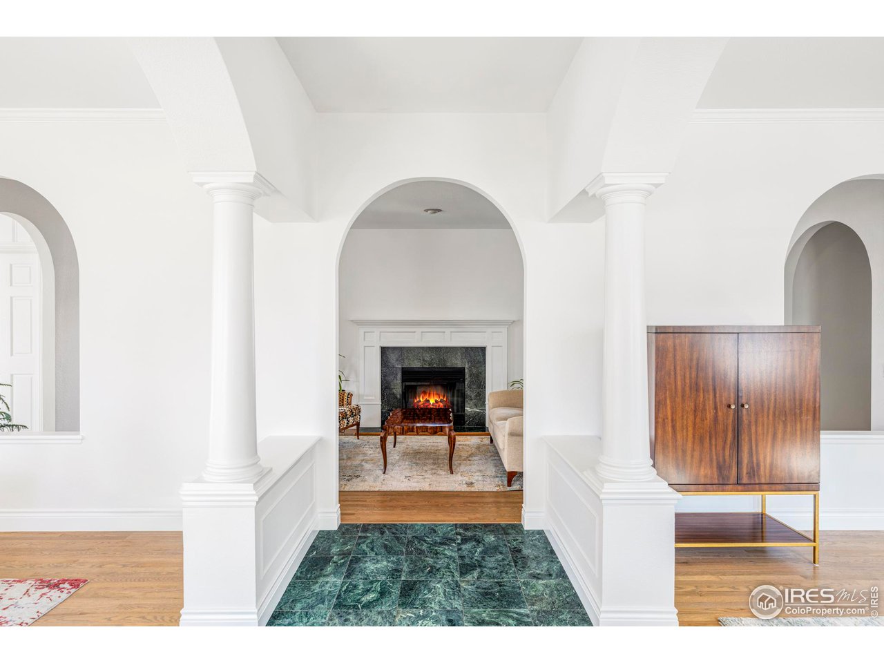 2485 Agate Lane Boulder, CO 80304 - Photo 5 of 38 a view of a livingroom with furniture and a fireplace