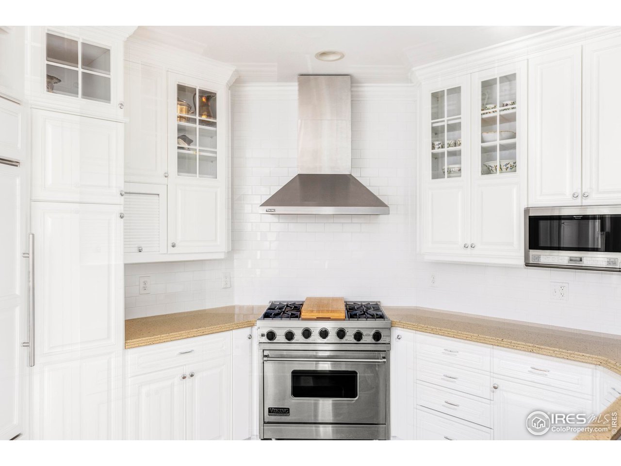 2485 Agate Lane Boulder, CO 80304 - Photo 8 of 38 a kitchen with cabinets and appliances