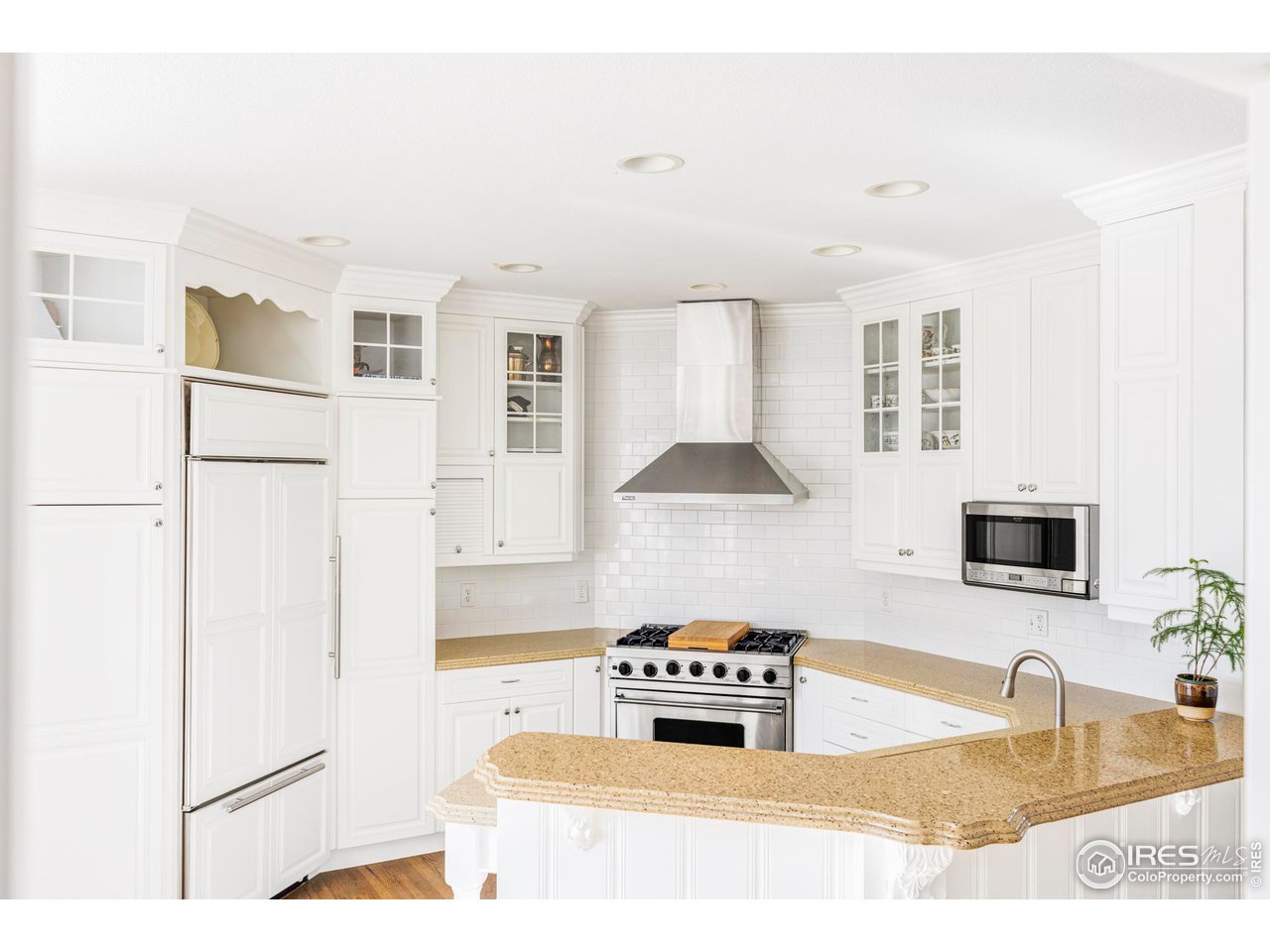 2485 Agate Lane Boulder, CO 80304 - Photo 9 of 38 a kitchen with stainless steel appliances granite countertop a sink stove and refrigerator