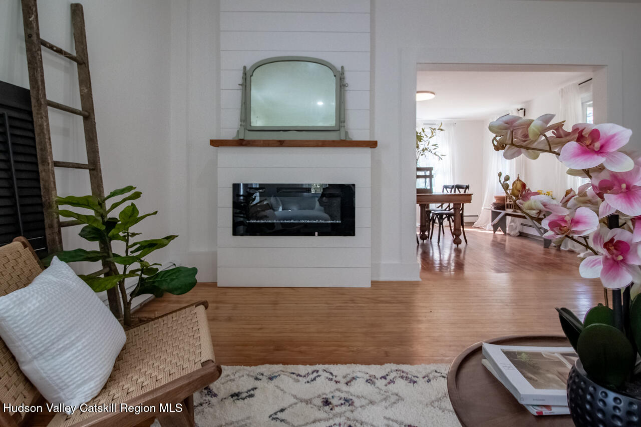 10 State Rte 55 Napanoch, NY 12458 - Photo 14 of 42 a living room with furniture and a fireplace