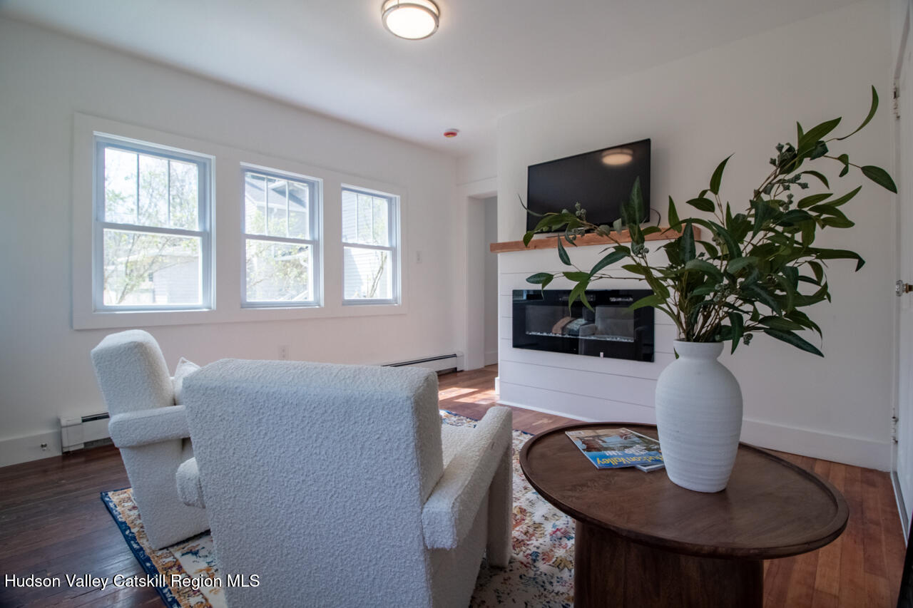 10 State Rte 55 Napanoch, NY 12458 - Photo 23 of 42 a living room with furniture and a potted plant