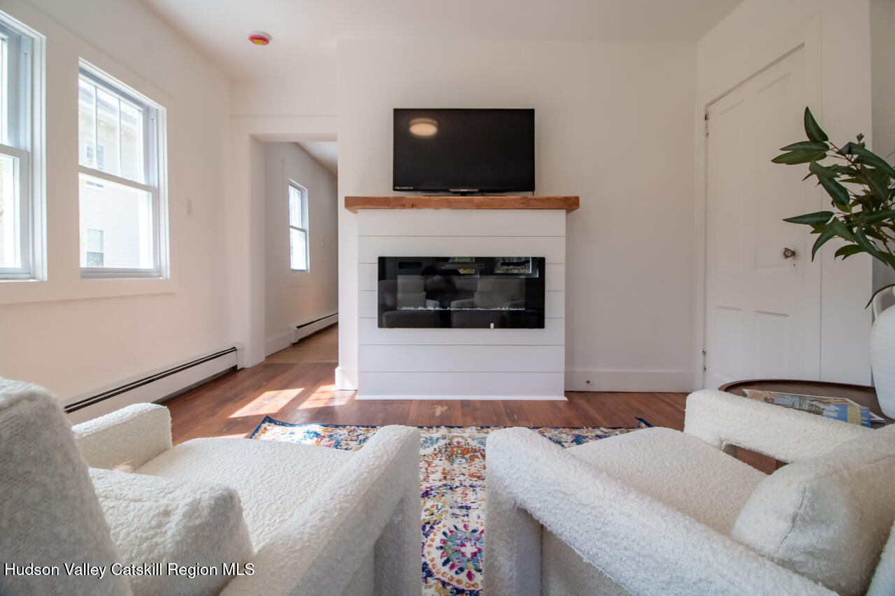 10 State Rte 55 Napanoch, NY 12458 - Photo 26 of 42 a bedroom with a bed and a fireplace