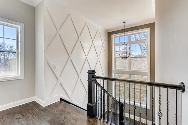 a view of entryway with wooden floor