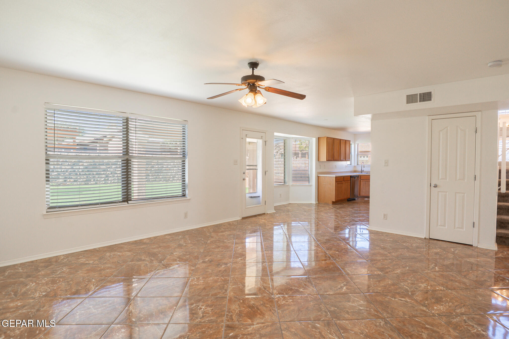 1497 Dunlin Place El Paso, TX 79928 - Photo 11 of 38 a view of livingroom with hardwood floor and a ceiling fan