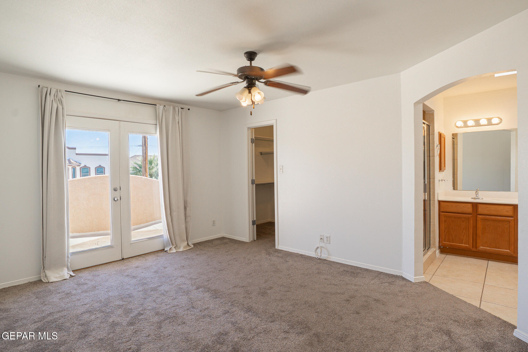 1497 Dunlin Place El Paso, TX 79928 - Photo 19 of 38 a view of empty room with a sink and a mirror