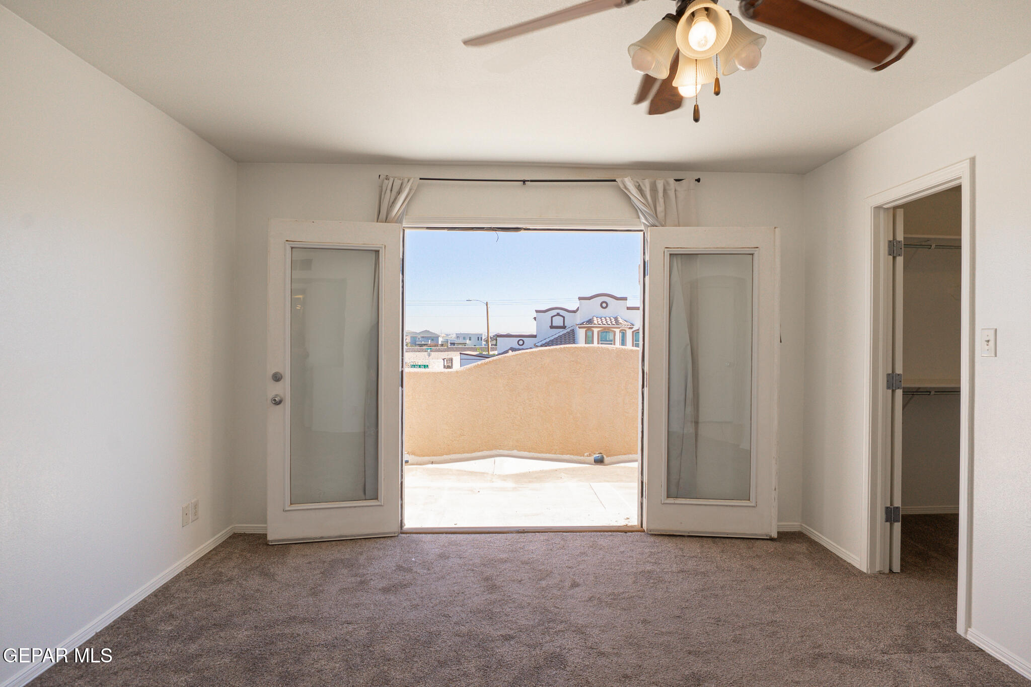 1497 Dunlin Place El Paso, TX 79928 - Photo 21 of 38 a view of an empty room and window