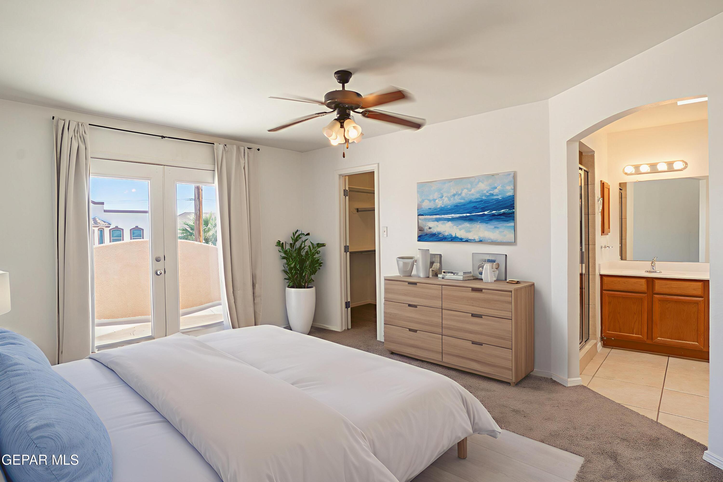 1497 Dunlin Place El Paso, TX 79928 - Photo 25 of 38 a bedroom with a bed and a dresser