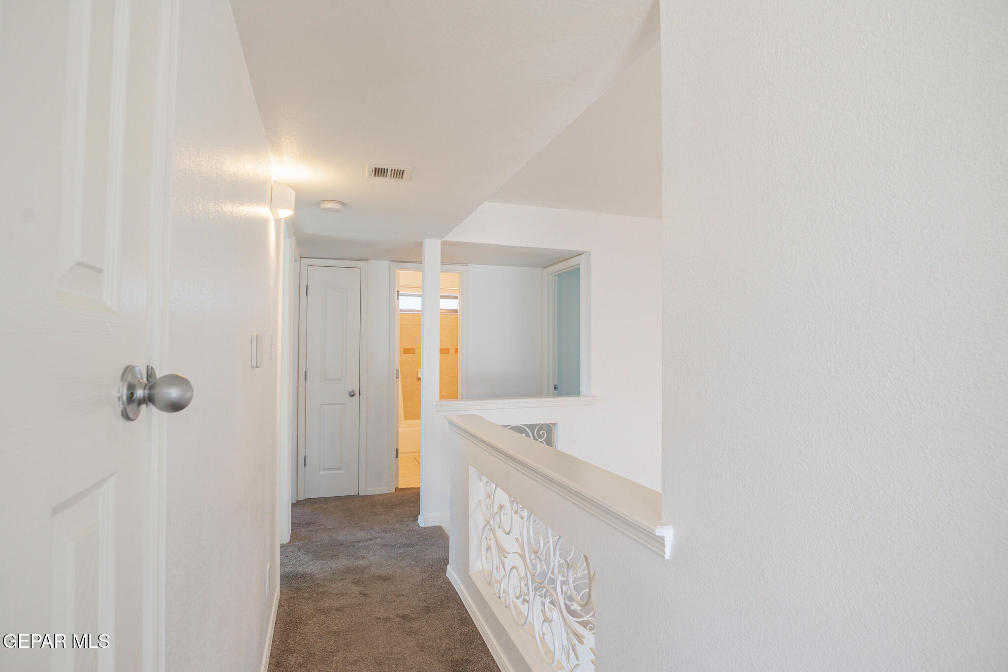 1497 Dunlin Place El Paso, TX 79928 - Photo 26 of 38 a bathroom with a sink a vanity and a mirror