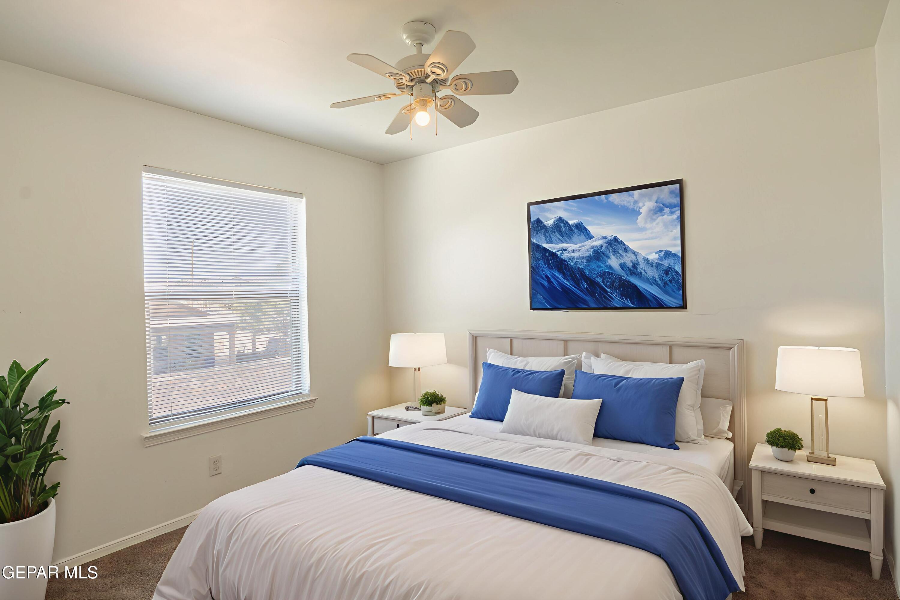 1497 Dunlin Place El Paso, TX 79928 - Photo 33 of 38 a bedroom with bed and a window