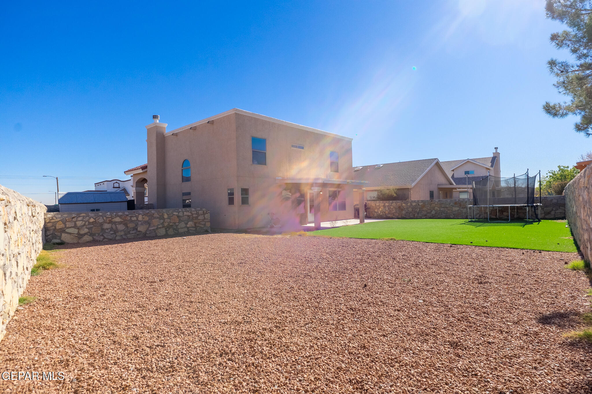 1497 Dunlin Place El Paso, TX 79928 - Photo 36 of 38 a house with yard in front of it