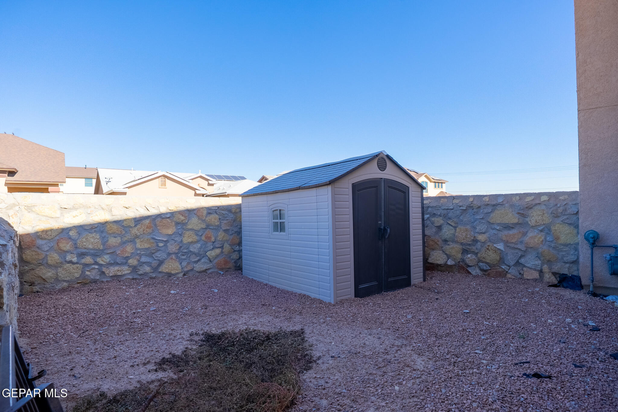 1497 Dunlin Place El Paso, TX 79928 - Photo 38 of 38 a view of a house next to a yard